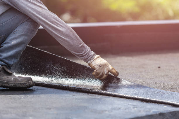 Professional Waterproofing technician working in Buchtel, OH